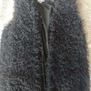 Black faux fur vest